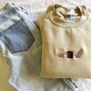 cozy fall candle trio embroidered sweatshirt 2d crewneck sweatshirt for men and women sws2903 1.jpeg