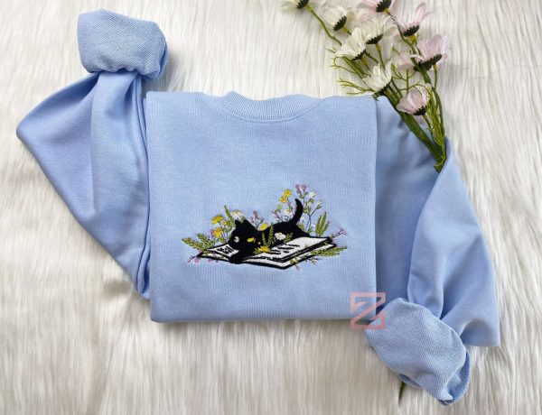 Cute Cat Lying On Book With Flower Embroidered Sweatshirt Gift For Christmas