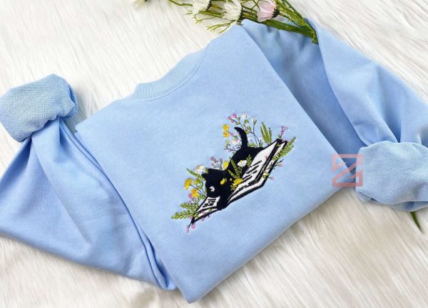 Cute Cat Lying On Book With Flower Embroidered Sweatshirt Gift For Christmas