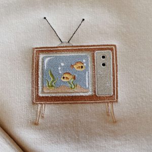 embroidered aquarium tv sweatshirt 1.jpeg