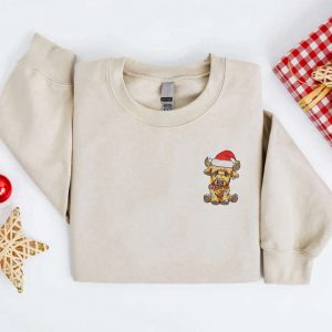 embroidered christmas cow sweatshirt highland cow santa christmas sweater for family.jpeg