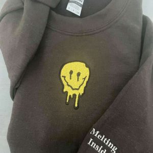 smiley face embroidered sweatshirt melted smiley face crewneck 3.jpeg