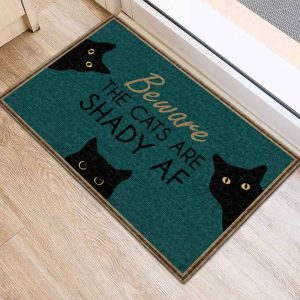 the cats are shady black cat doormat 1.jpeg